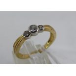 9 ct gold CZ set ring. Size O/P.