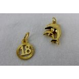 9 ct gold dolphin charm and 18 charm.