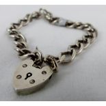 Sterling silver vintage 1966 solid charm bracelet with padlock and stamped on each link