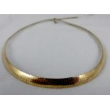 Reversible sterling silver and gold plate choker. L: 42 mm.