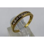 9ct gold channel set princess cut diamond half eternity ring. Approx 0.33ct, size L