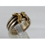 Sterling silver solid fancy band with gold detail. Size O/P