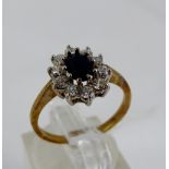 9 ct gold sapphire & cz ring. Size M.