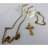 9ct gold chain and cross.  5.6 g