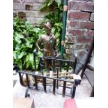 Brass figure with brass companion set