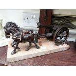 Brass horse drawn gun carriage on marble plinth. A/F ~ damage to corner