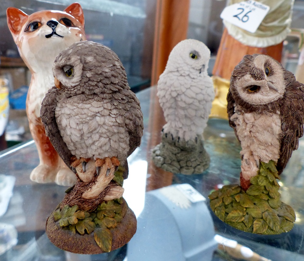 Ceramic Beswick cat and three Royal Doulton owls