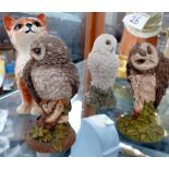 Ceramic Beswick cat and three Royal Doulton owls