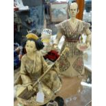 Pair of oriental figurines of a Samurai and a musician. Largest H: 27 cm