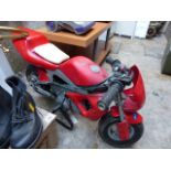 Red mini~moto motorcycle