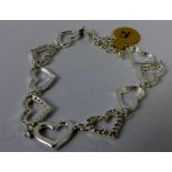 Sterling silver stone set hearts bracelet