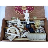 Box of collectables bone and faux ivory figures, brooches