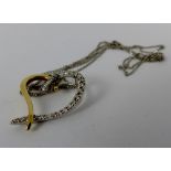 9ct yellow and white gold, 0.25ct diamond heart pendant on 9ct gold chain