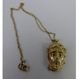 Heavy white metal pendant on chain depicting the face of Jesus