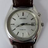 Seiko gents Kinetic watch with silver dial on leather strap. Working at lotting up