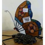 Tiffany style lamp depicting a butterfly