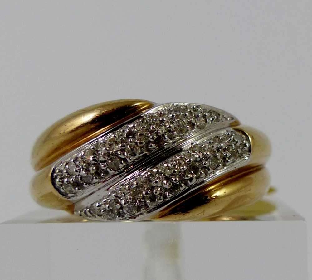 9ct gold diamond set two row fancy ring, size N/O. W: 4.9g