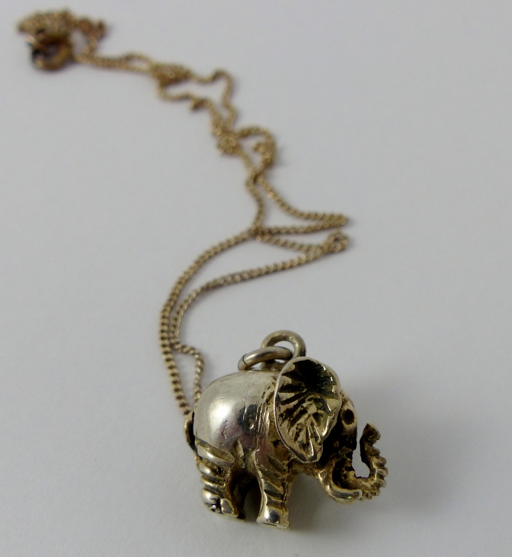 Sterling silver elephant pendant on chain.