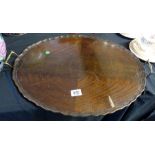 Pie crust edged oval tray with brass handles. L: 57 cm