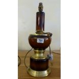 Table lamp in brown pottery and brass effect detail (not tested). H: 46 cm