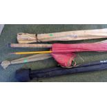 Quantity of vintage fishing rods and a walking stick