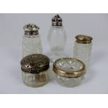 Five silver and white metal topped glass pots, ring box, pepperette etc
