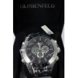 Globenfeld gents wristwatch on rubber and metal strap. New in box .