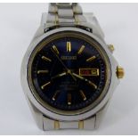 Gents stainless steel day and date Seiko Kinetic wristwatch