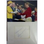 Autograph and photograph of Bobby Moore and two Manchester United signatures ~ one Tony Dunne. No