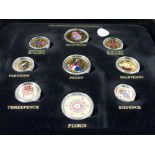 Cased Royal Mint Collection of pre and post decimal enamelled coinage