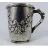 Silver christening cup, gilt interior, continental marks to base with blossom design, 45g