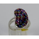 Sterling silver multi coloured stone set kidney shaped ring, size Q