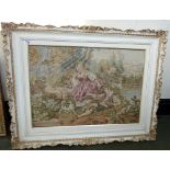 Gilt framed embroidered picture, lady, gent and dog at riverside