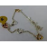 Sterling silver fancy bracelet with gold plated hearts