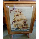 Oak firescreen with woolwork galleon