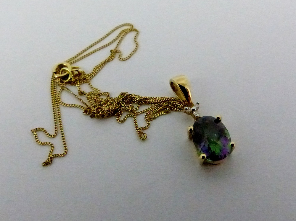 9ct gold mystic topaz pendant on 9ct gold necklace