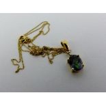 9ct gold mystic topaz pendant on 9ct gold necklace