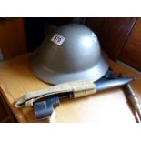 Post war tin hat for Anti Aircraft Gunner and a bayonet from WWII