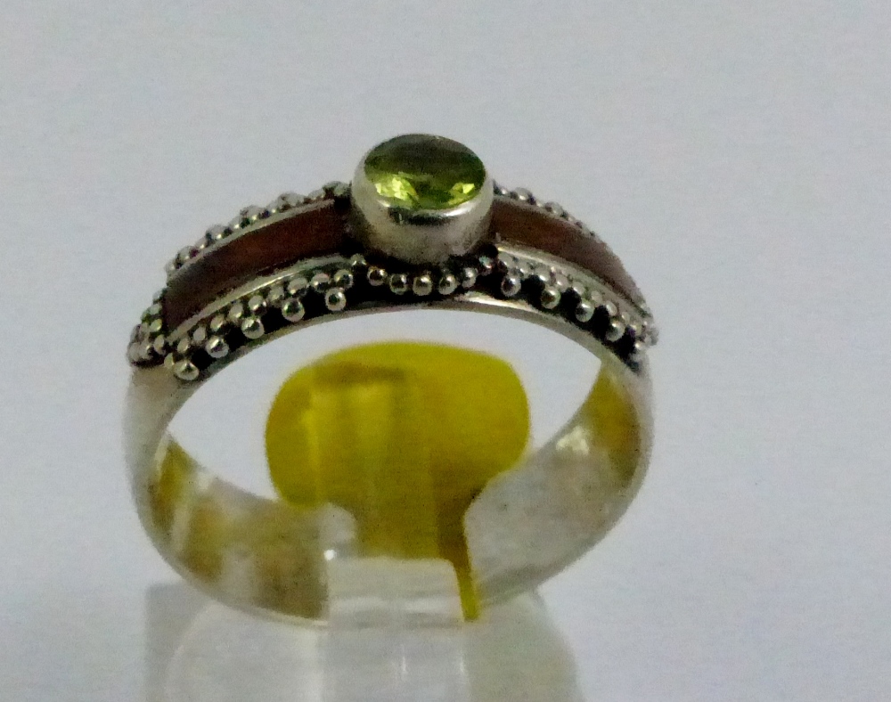 Silver peridot ring, size P