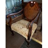 Upholstered rattan back armchair