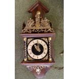 Mechanical wall clock with brass edging and weight movement