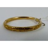 9ct gold ladies hinged bangle, tested as gold, 13g