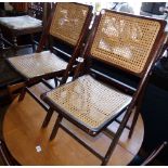 Pair of folding rattan chairs