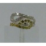 Sterling silver white and yellow stone double loop ring, size M