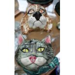 Two ceramic wall hanging string dispensers depicting cats head and dogs head