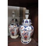 Pair of matching blue, red and white lamps
