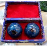 Cased pair of ceramic stress balls