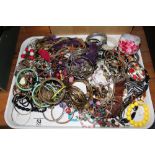 Tray of unsorted costume jewellery