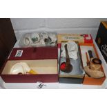 Five boxed tobacco pipes and selection of crested ware