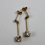 Pair of 9ct gold diamond set drop earrings